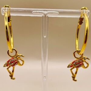 Gold tone hoops with pink and rhinestone flamingo charms. For pierced ears.